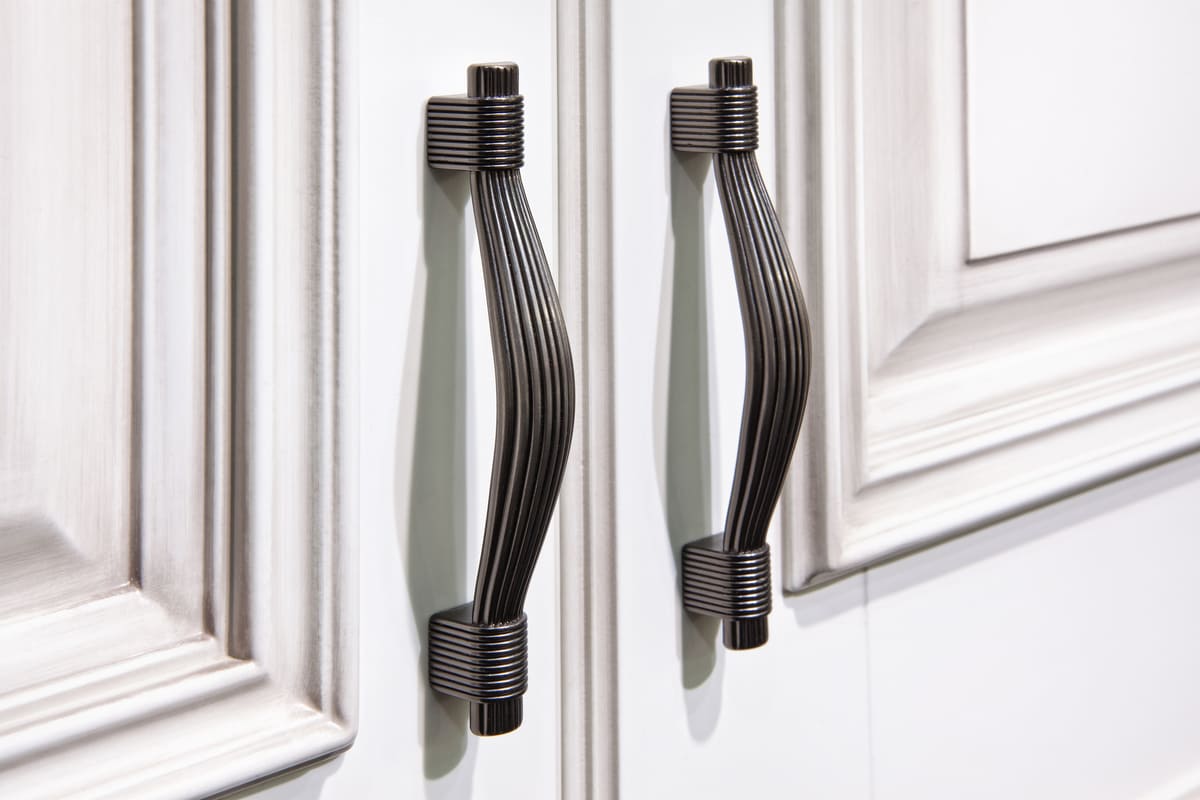 A close up of some luxury kitchen cabinet handles